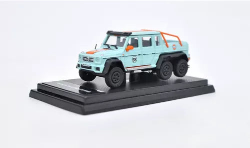 1/64 scale Mercedes-Benz G63 6x6 AMG diecast toy, mint blue with orange stripe, on base