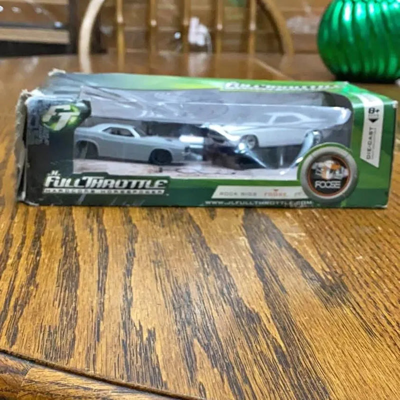 1/64 scale diecast car in box, silver-gray with black wheels