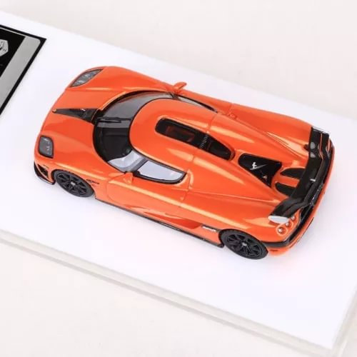 Orange sports car model toy, diecast resin, side view