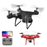 Black quadcopter drone with HD camera and remote controller screen