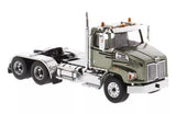 Green diecast tandem tractor model with chrome bumper, black hood, and cab details
