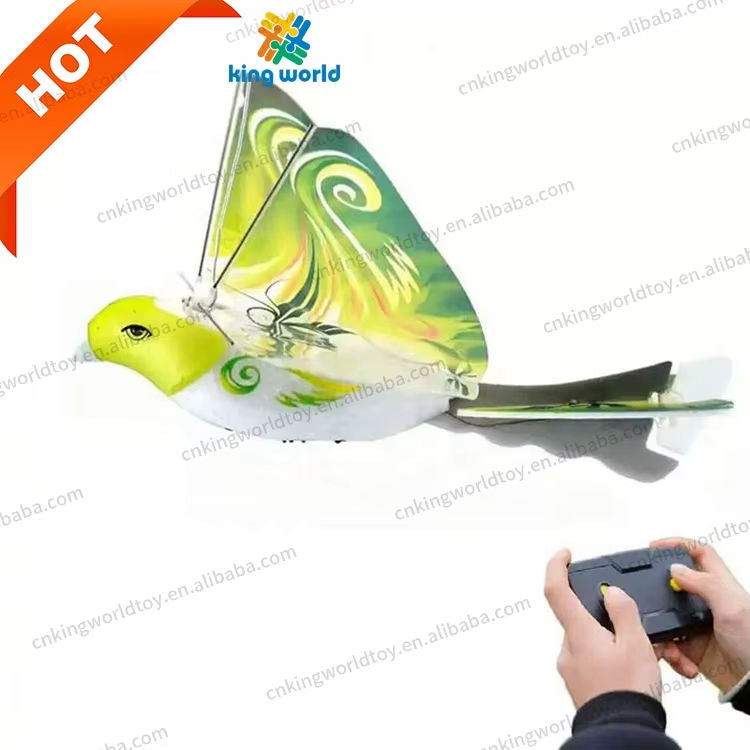 Green bird-shaped remote control flying drone toy with 2.4GHz controller