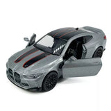 Gray BMW M4 CSL diecast model car with open door, pull-back action