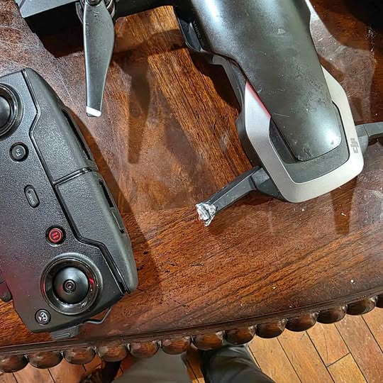 DJI Mavic Air drone with broken rear left landing leg