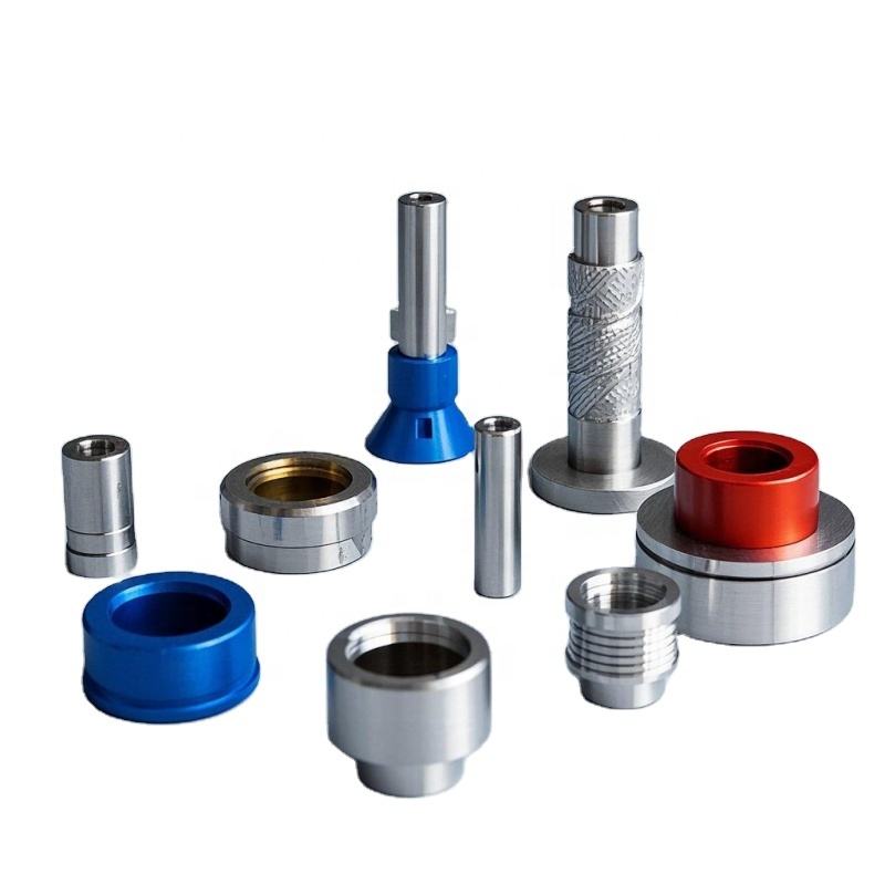 Small CNC-turned stainless steel metal parts with blue and red anodized rings