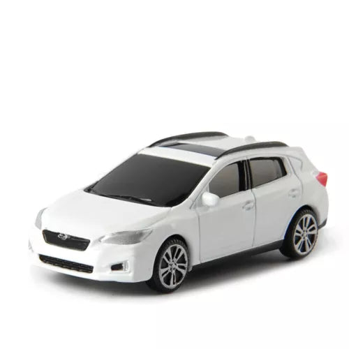 White Subaru Impreza 5-door diecast car model, front three-quarter view, sport toy