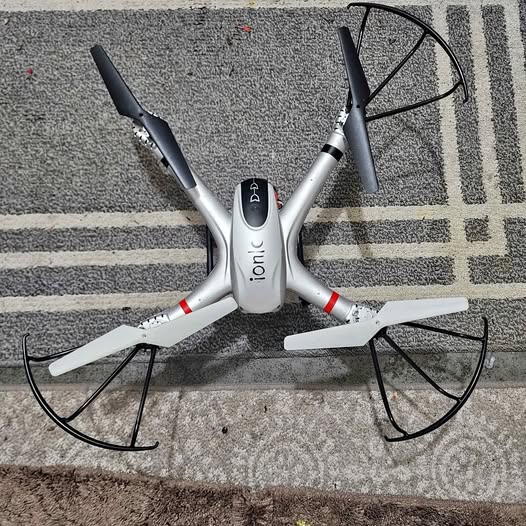 Ionic Stratus drone quadcopter with four propellers and silver body, seen from above