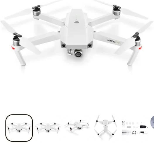 White quadcopter drone with four propeller arms and front camera pod