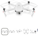 White quadcopter drone with four propeller arms and front camera pod