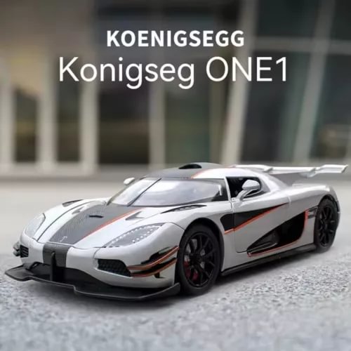 Scale diecast supercar toy, silver body with black wheels and side details