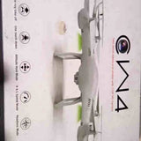 Gray camera drone with front camera lens and landing gear, side view