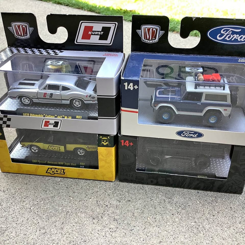 1:64 scale diecast race cars in boxed packaging with Ford logo and Hurst graphics