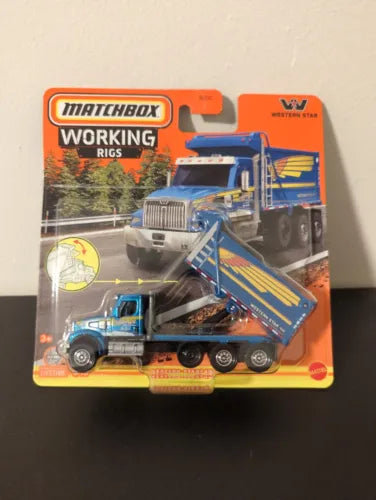 Matchbox Working Rigs Western Star 49X dump truck diecast on retail package, blue and silver