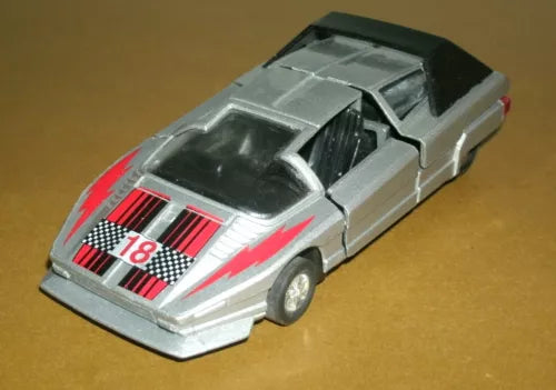 Diecast concept car, silver-gray with red and white racing stripes and number 18 detail