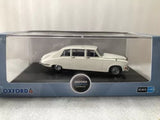 Diecast vintage sedan model, white/cream, in presentation display box