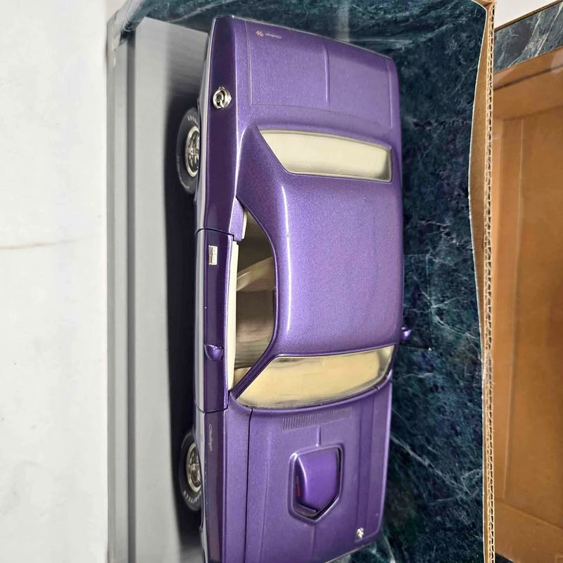 Purple 1:18 diecast muscle car model, front side view