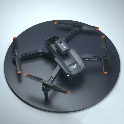 Quadcopter drone with four rotors, dark body and orange accents, top view