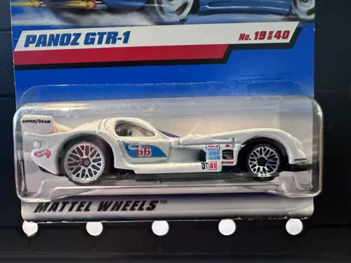 White diecast race car with blue number decals and open-wheel design