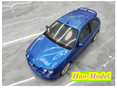 OTTO blue resin model car, front three-quarter view with clear windows