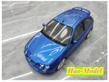 OTTO blue resin model car, front three-quarter view with clear windows