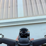 Drone with front camera gimbal and two front arms