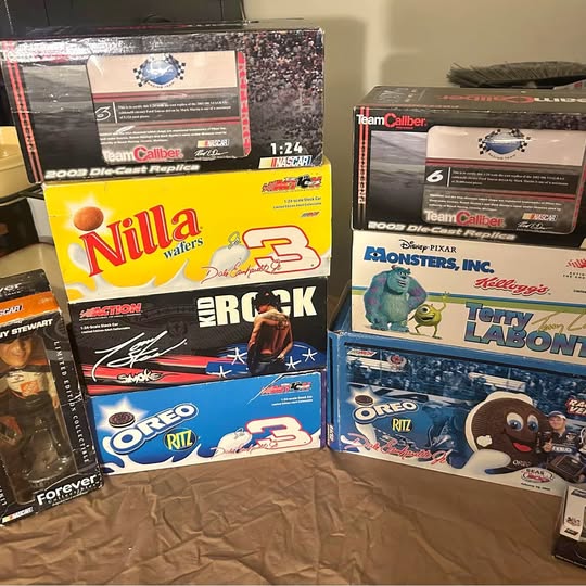 Assorted diecast car collectible boxes, Team Caliber and movie Lab car themes