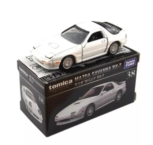 Tomica diecast model car, white with black hood, boxed Mazda Savanna RX-7