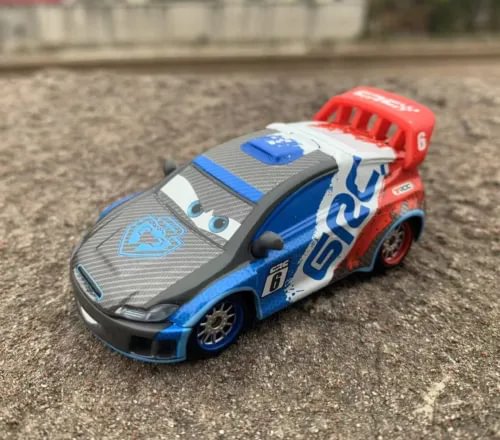 Diecast race car toy in red, blue, and gray with front grille and number 6 detail