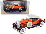 1930 Packard boattail speedster diecast car model, orange and maroon, whitewall tires