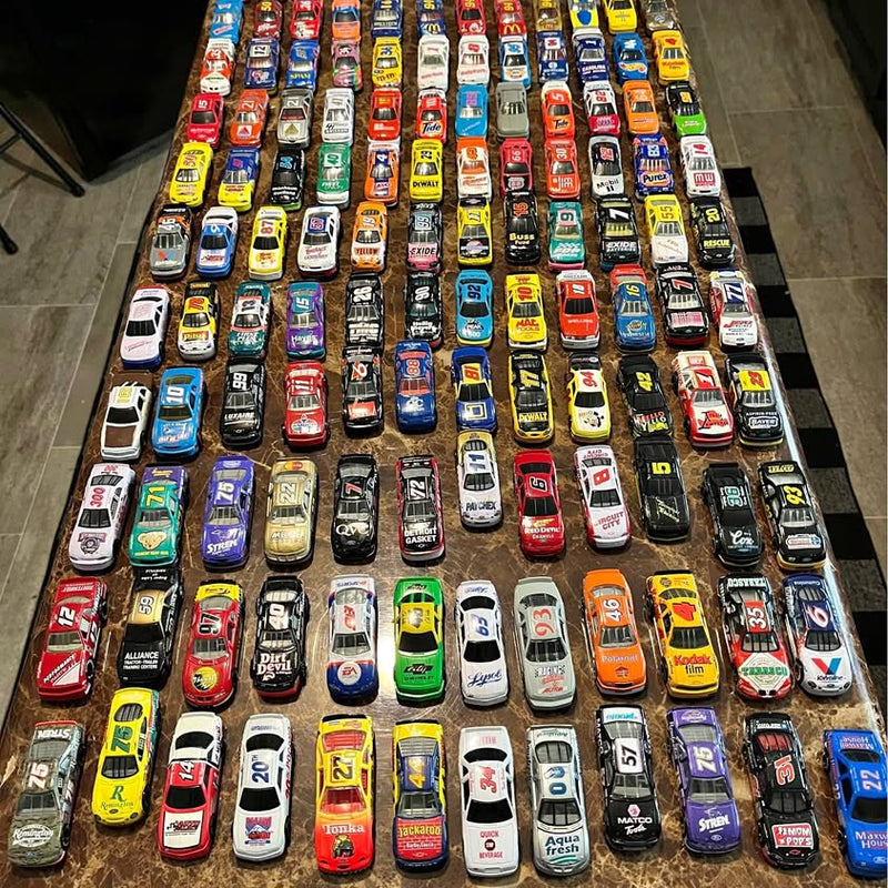 Assorted NASCAR diecast race cars models in various colors and liveries