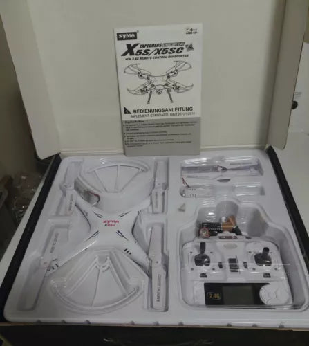 White Syma X5SC Explorers 2 quadcopter drone in packaging tray