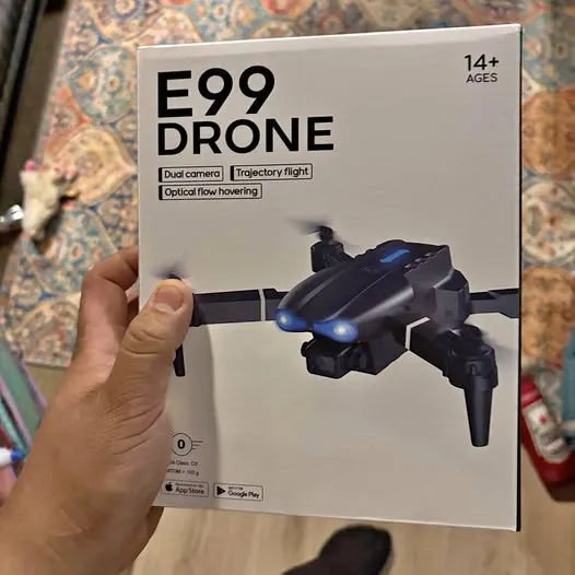 Drone with camera product box with illustrated black and blue quadcopter, “E99”