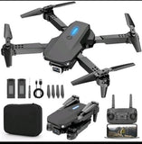 Foldable beginner drone with camera, four propellers, remote and accessories in black case