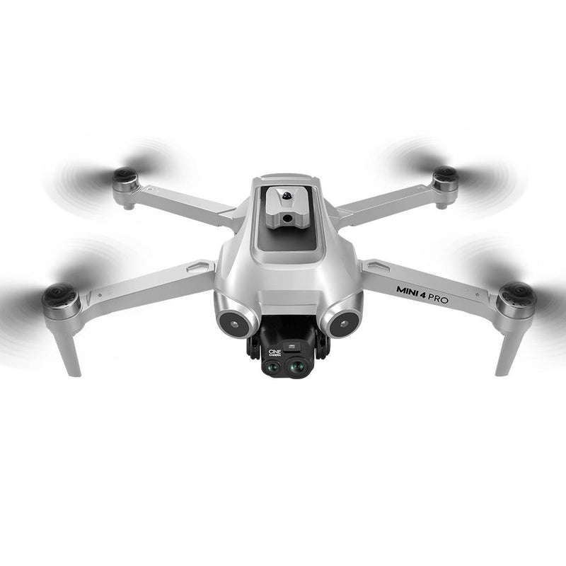White quadcopter drone with front camera and four propellers, plastic body
