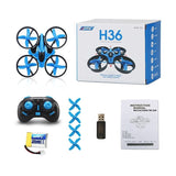 Mini quadcopter drone with camera, blue propellers, remote controller and manual