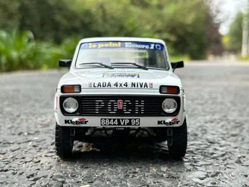 1:18 diecast racing car model, front view, white Lada Niva 4x4