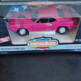 Pink 1:18 diecast muscle car in box, AmericanMuscle logo on packaging