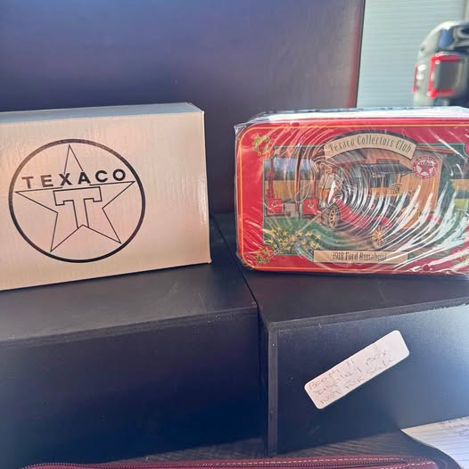 Texaco diecast Ford runabout model in red blister packaging with Texaco logo
