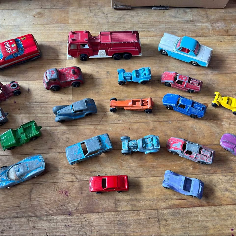 Assorted colorful diecast toy cars, multiple vehicles shown together