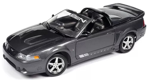 Diecast model car of a dark gray performance coupe with silver wheels and rear spoiler.