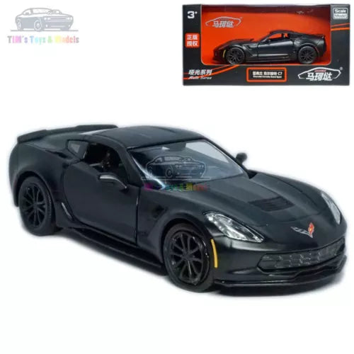 Black diecast Corvette C7 model car, front three-quarter view with headlights and grille