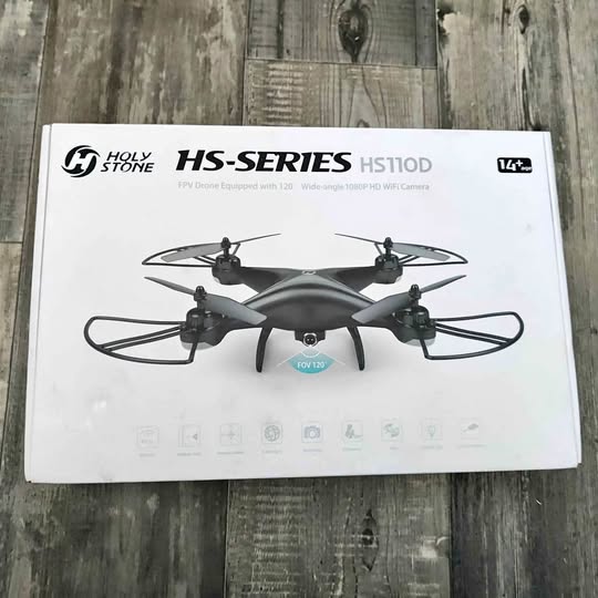 HS-Series HS110D drone in retail box, front view with printed product image