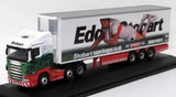1/76 scale diecast Scania truck model with white cab and red trailer