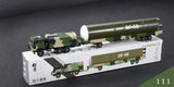 Diecast missile model with olive green camouflage launcher on white display box