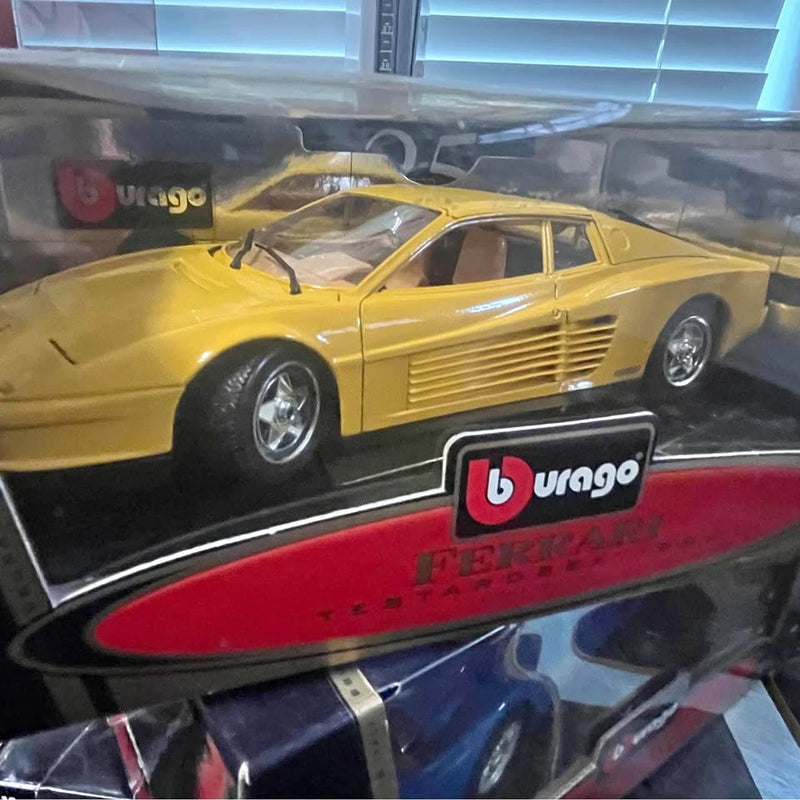 1:18 diecast sports car model, yellow with black stripe and chrome wheels