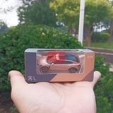 1/64 pink diecast model car in display box