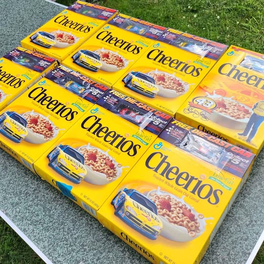 Cheerios cereal box set with blue and yellow packaging