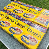 Cheerios cereal box set with blue and yellow packaging
