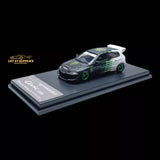 1:64 diecast toy car with green racing livery on white base
