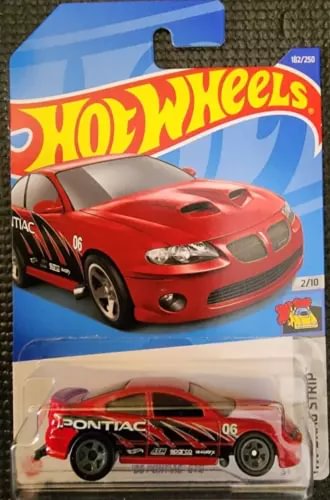 Red Pontiac GTO '06 diecast car in blister pack with Hot Wheels branding